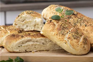 Oregano-Baguette mit Parmesan Oregano-Baguette mit Parmesan